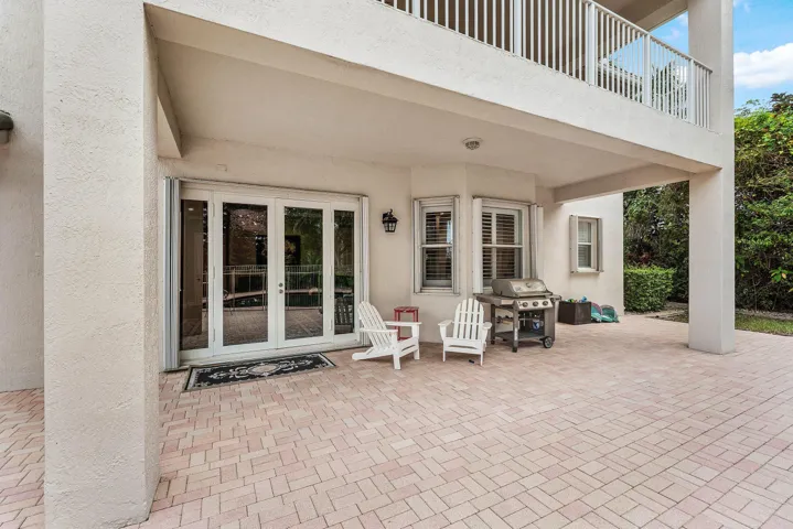 Large patio with private pool and lake views