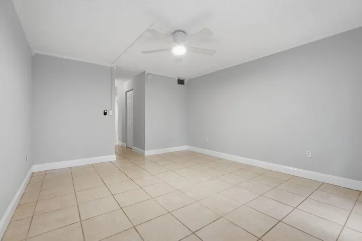 Bedroom view looking towards 2 walk in closets and master bathroom