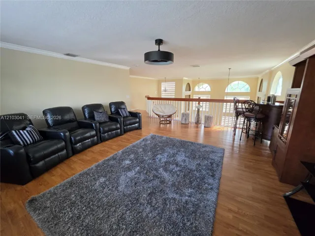 Wood-finish flooring with an open-concept layout