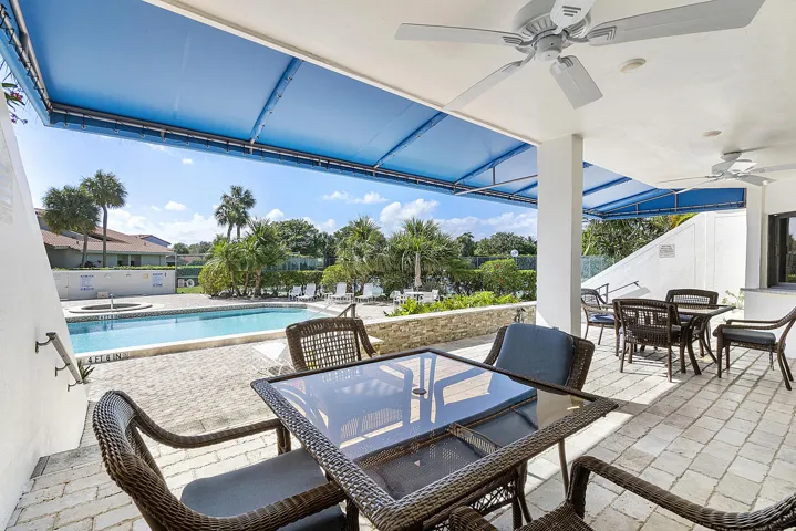 Covered patio area near the pool deck