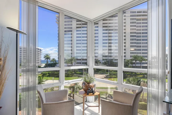 Floor to ceiling windows capture the Ocean view