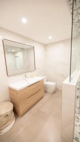 Modern vanity with two large drawers, integrated sink, and contemporary faucet