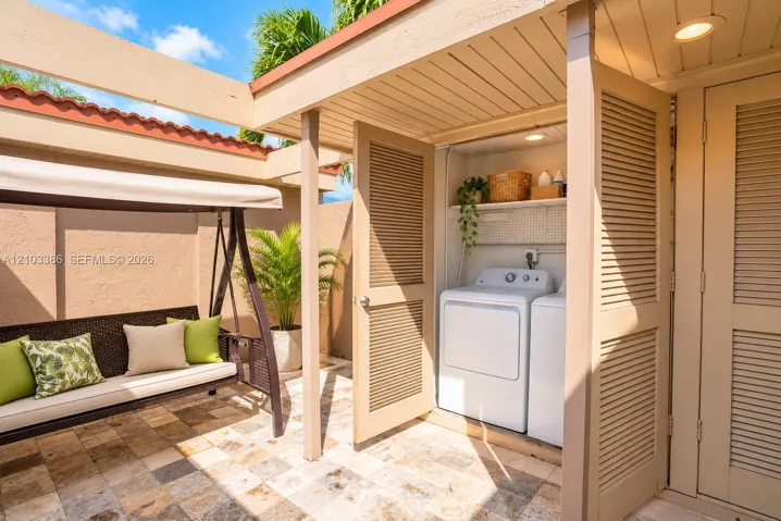 Laudry is in courtyard. yYou can sip your coffee and relax in the courtyard until laundry is finished.