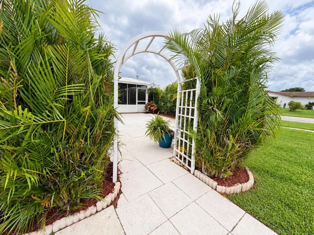 Garden Arch with Lush Green Lawn