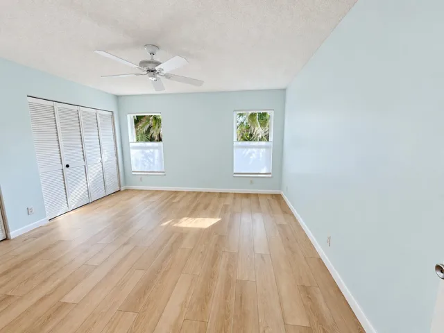 Bright natural-light primary bedroom