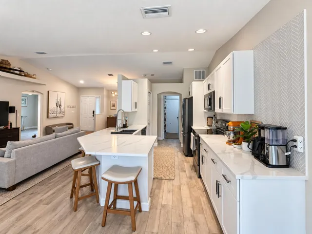 Living Room with Kitchen Island and Couc
