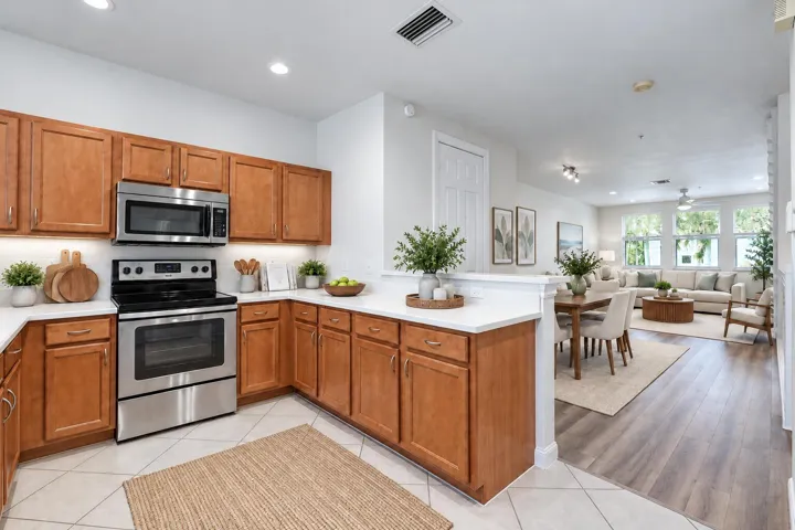 kitchen and living room with staging
