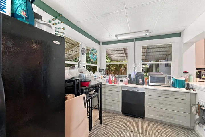 Enclosed Porch Off Of Kitchen