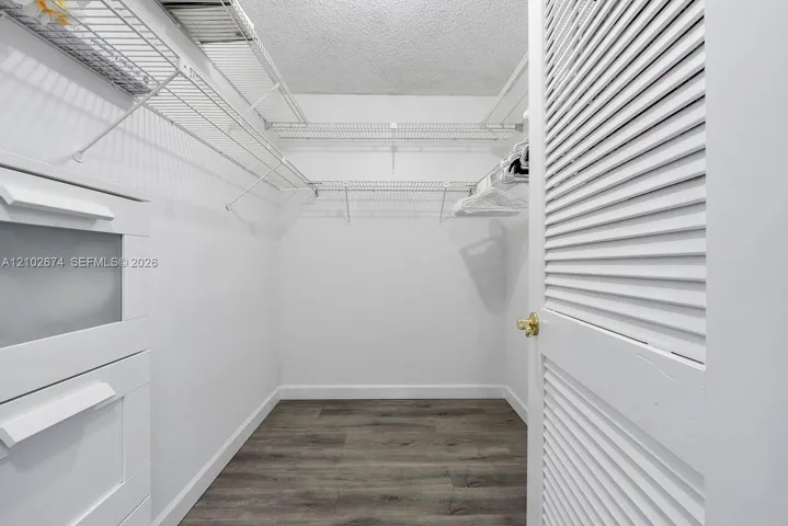 Primary Bedroom Walk In Closet