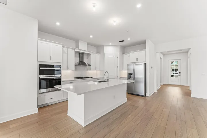 Stock photos represent builder's floorplan