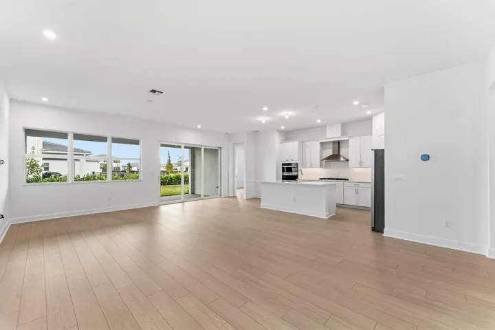 Stock photos represent builder's floorplan