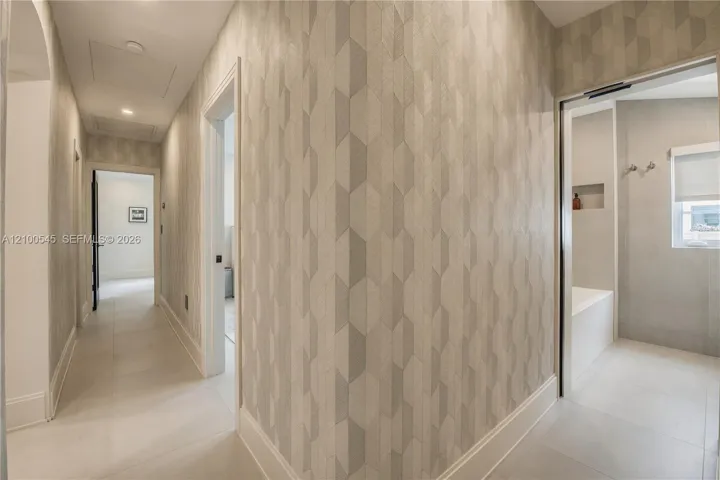Wallpapered Hallway for separate sleeping wing of residence.