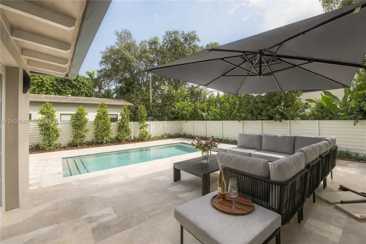 Elevated deck with wrap-out stairs to new pool (12x24)