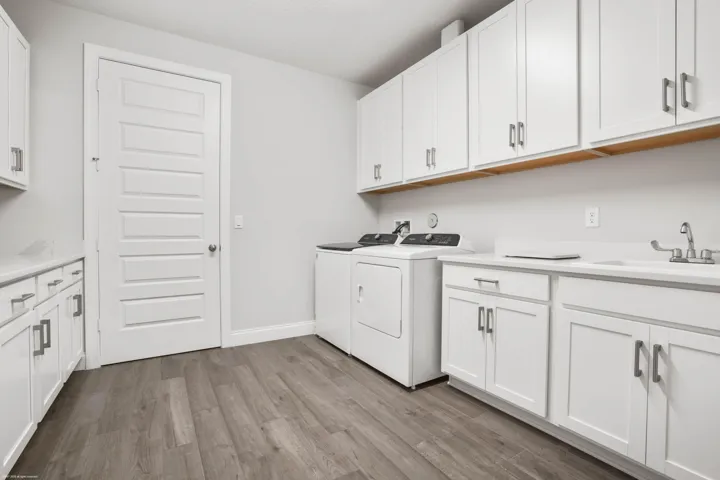 Laundry room with cabinetry and counter space