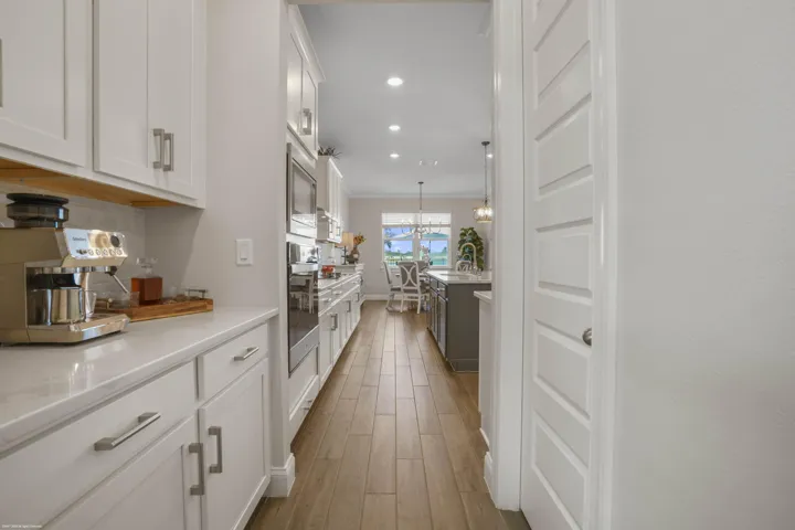 Butler's kitchen with built-in cabinetry
