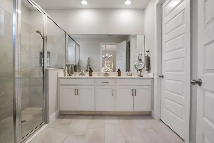 Primary bath vanity and walk-in​​‌​​​​‌​​‌‌​‌‌​​​‌‌​‌​‌​‌​​​‌​​ shower
