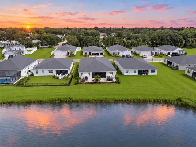 Twilight aerial of lakefront homes in Hampton Park