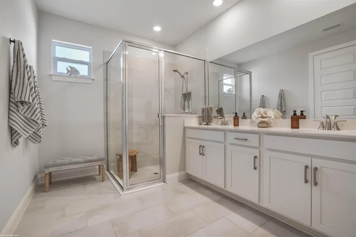 Primary bath with dual vanity and walk-in shower