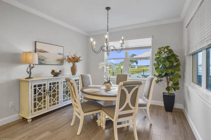 Breakfast nook with chandelier and built-in buffet
