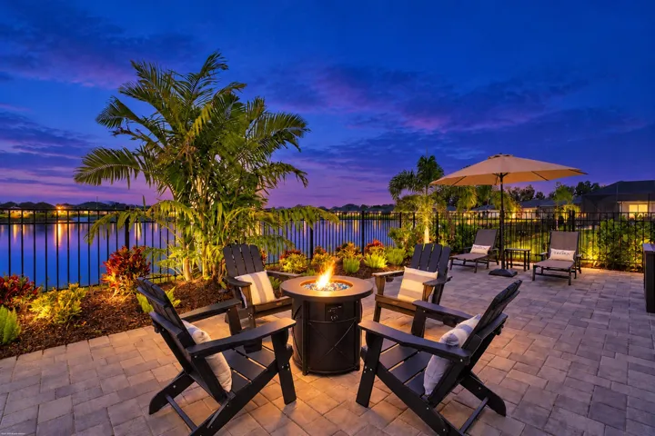 Lanai fire-pit seating at twilight