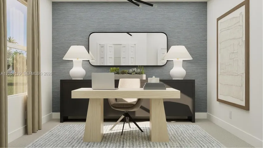 The sole bedroom on the first floor, this flexible space works well as a studio, lounge or home office, as shown here.