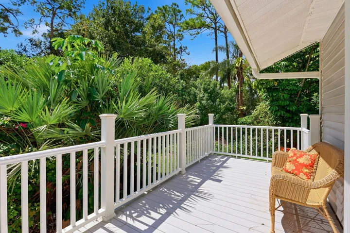 Marine grade composite wood outdoor deck with white railing