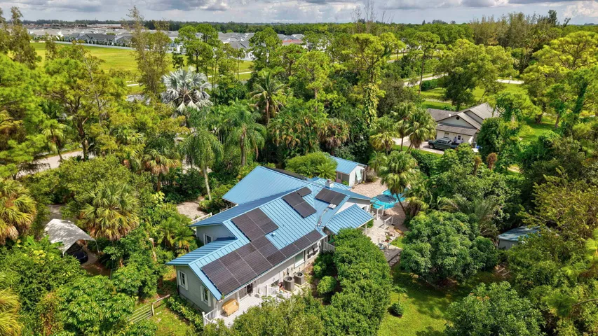 Light blue metal roof with solar panels