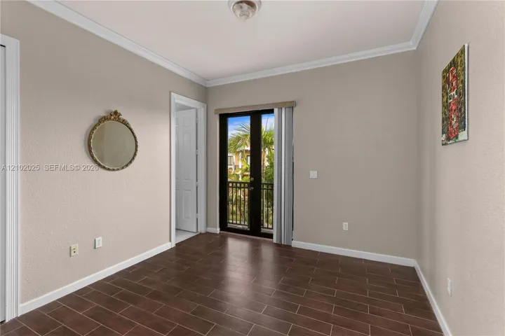 Front bedroom with balcony