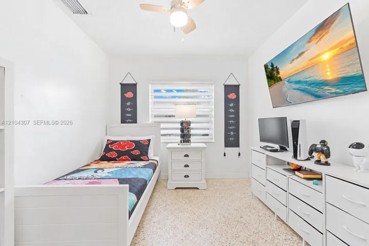 Could be 4th bedroom or home office (behind barn door)