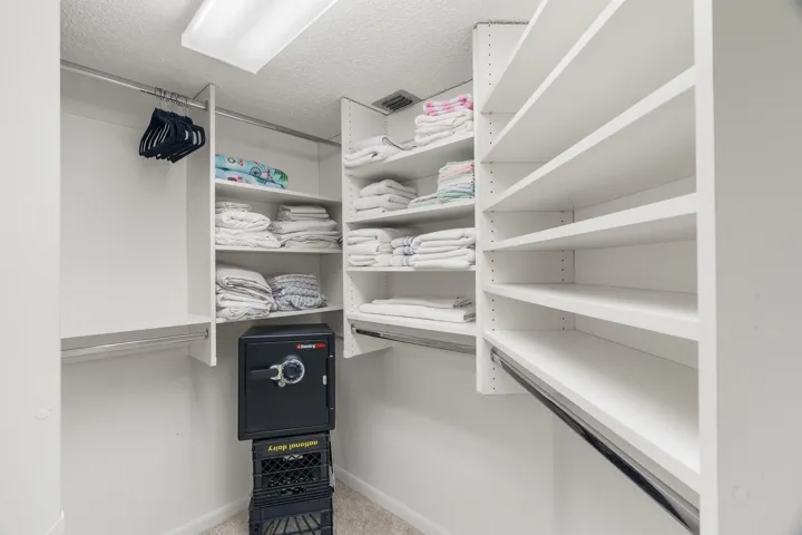 Closet in primary bedroom