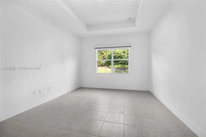 Primary Suite, view from closet hallway