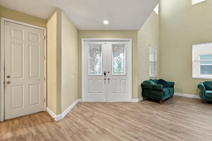Welcoming Foyer and Double Door Entry