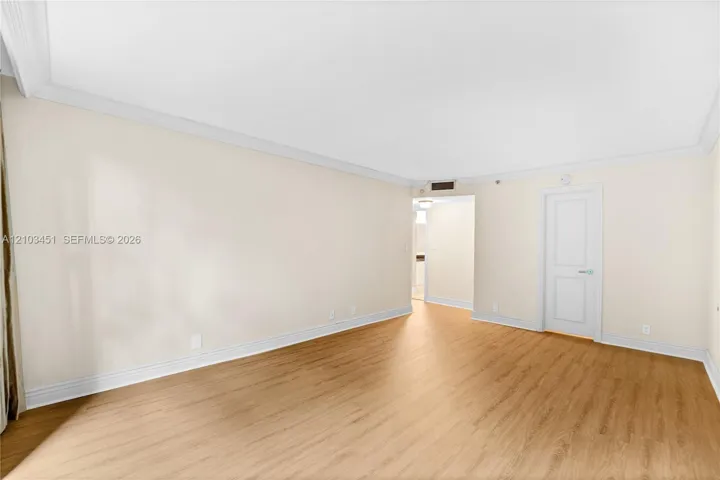 REVERSE VIEW OF THE PRIMARY BEDROOM SUITE