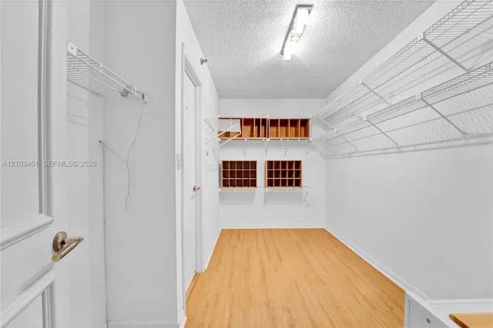 PRIMARY BEDROOM WALK IN CLOSET