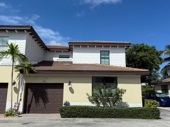 One car garage with overhead storage.