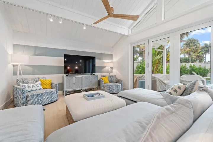 volume ceilings + oversized windows... bright + airy!