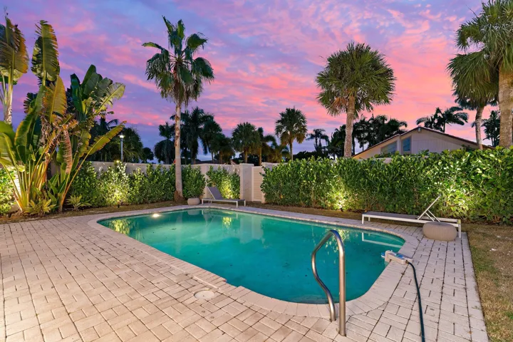 Enjoy a private outdoor oasis with pool AND yard!