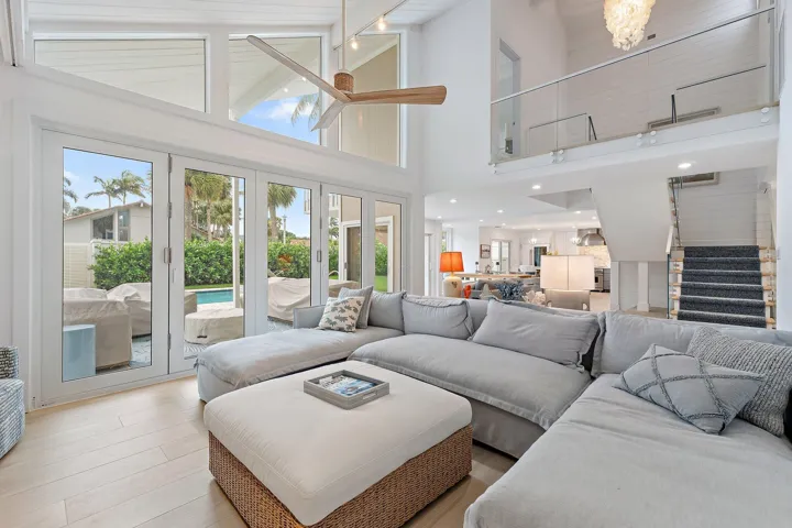 tons of natural light from double height windows + ceiling