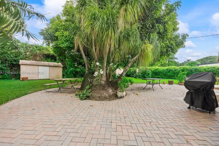 Backyard Patio & Storage Bldg