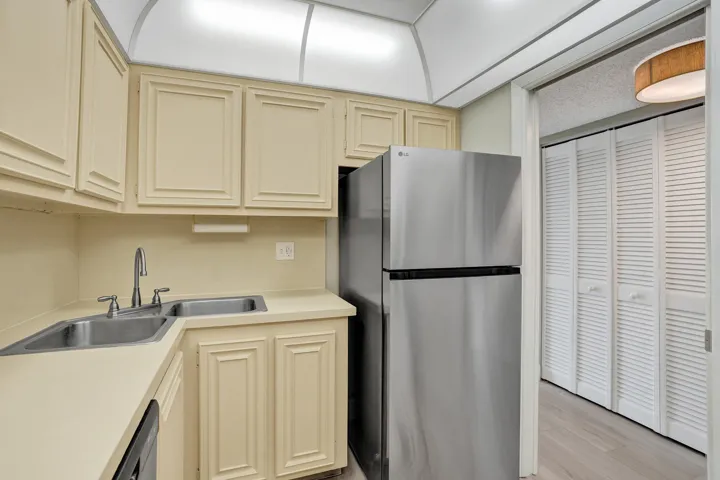 Charming vintage kitchen cabinetry with Stainless Steel Appliances