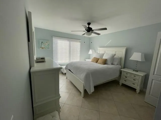 Master Bedroom has a Queen Size Bed Impact windows large walk in closet -ceiling fan and waterview