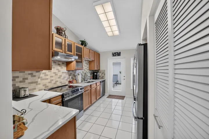Kitchen - Quartz & Wood Cabinets