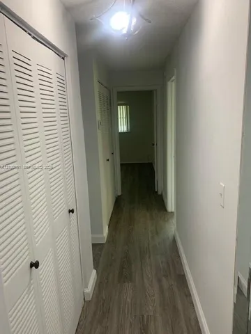 Hallway to bedrooms and laundry