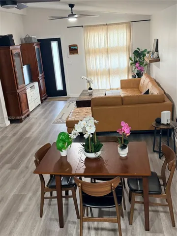 Light-toned wood-finish flooring throughout