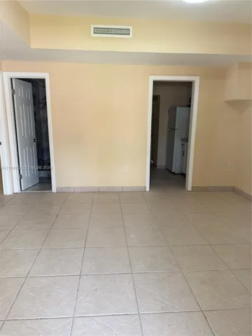 Ceramic tile flooring, interior doors, and a built-in shelf