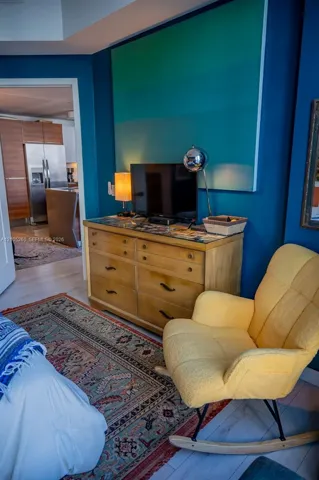 Wood-finish flooring throughout the space