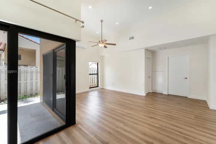 Vaulted ceilings and wood-finish flooring