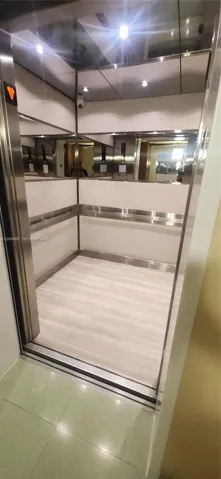 Modern fast elevators with 3 on each floor