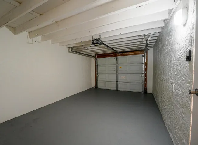 1-car garage with electric garage door opener