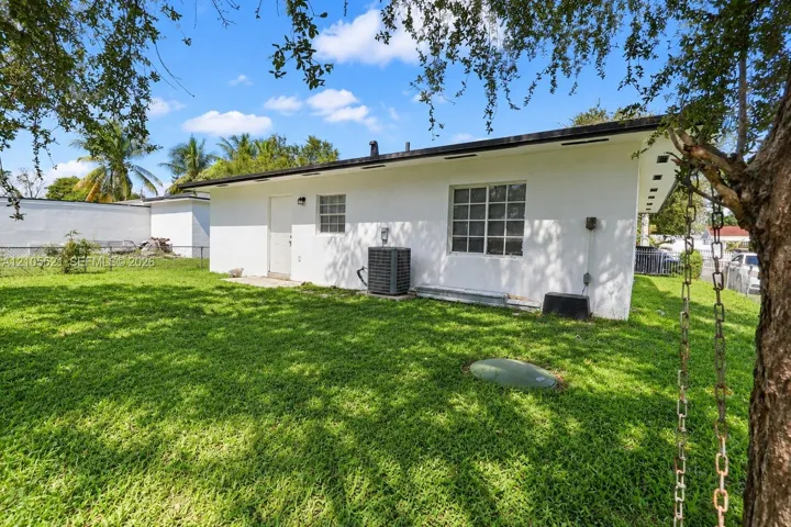 White exterior with multiple windows